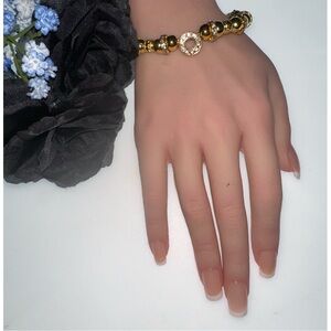 “O” Gold Tone Beaded Crystal Bracelet